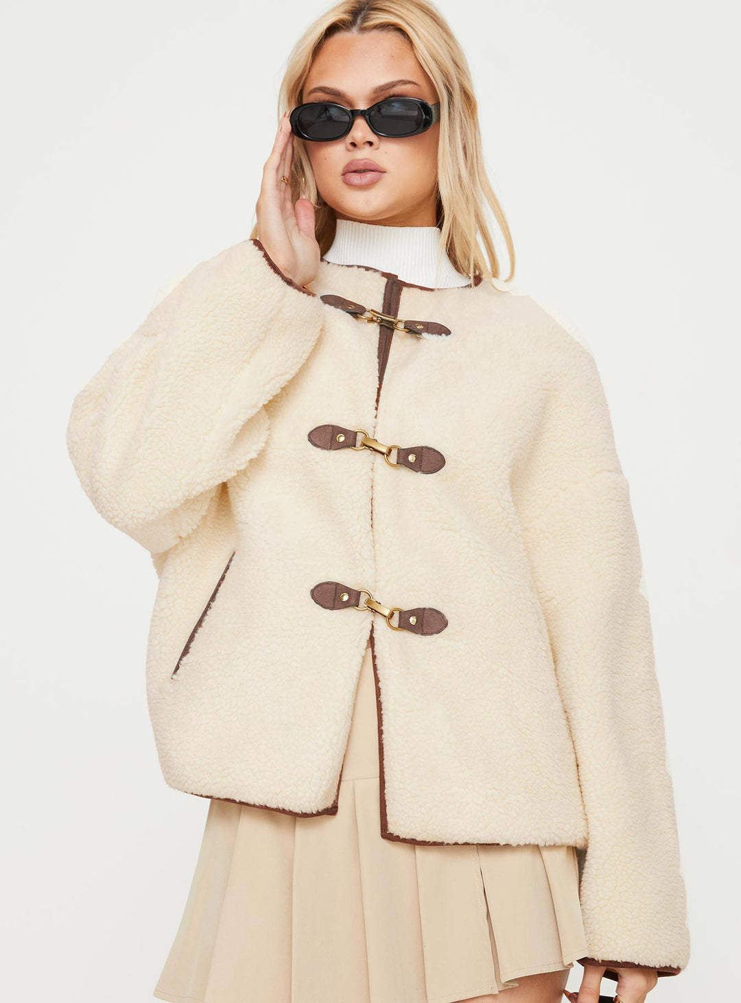 Sara | Women’s oversized teddy coat with contrast clasp detail