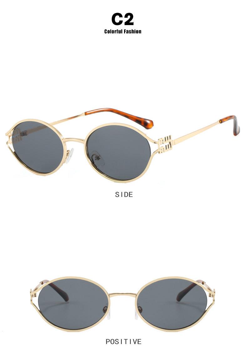 Sumer | Women's oval frame sunglasses with gold frame and brown/black lenses