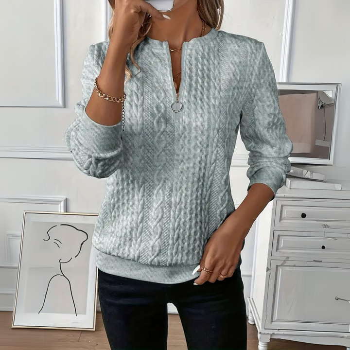 Cindy | Women’s knitted sweater with cable pattern and zip detail