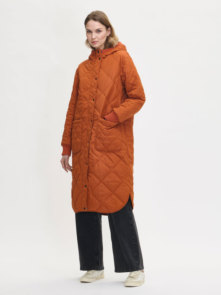 Solana | Women’s long quilted hooded coat with oversized patch pockets