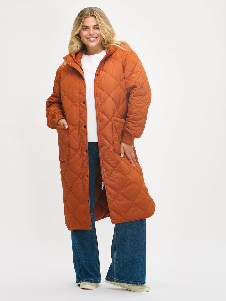 Solana | Women’s long quilted hooded coat with oversized patch pockets