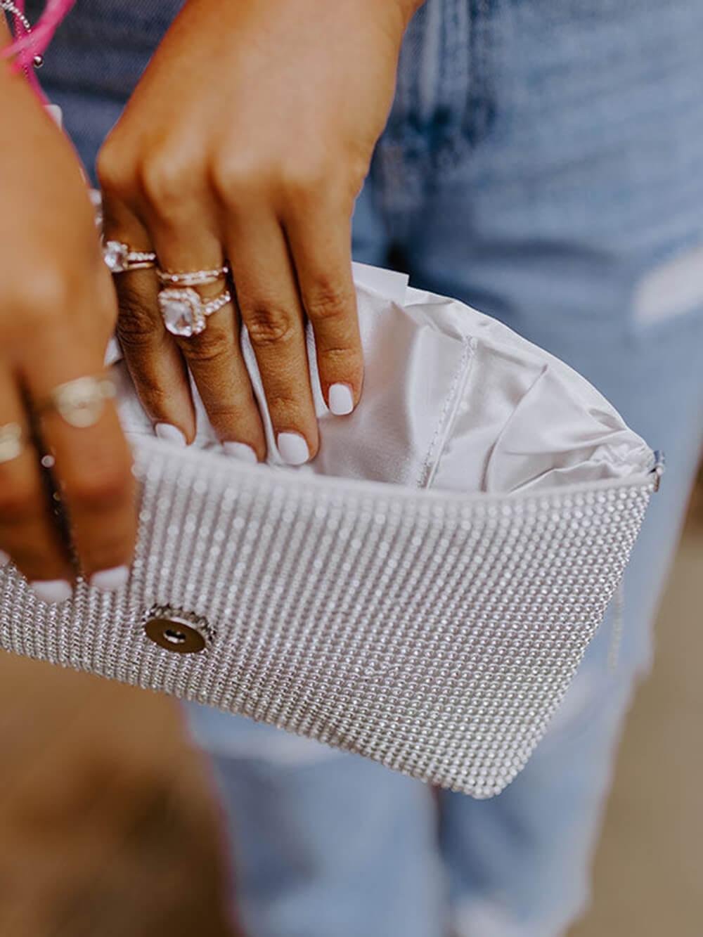 Susie | Women’s crystal beaded clutch bag with fringe detail