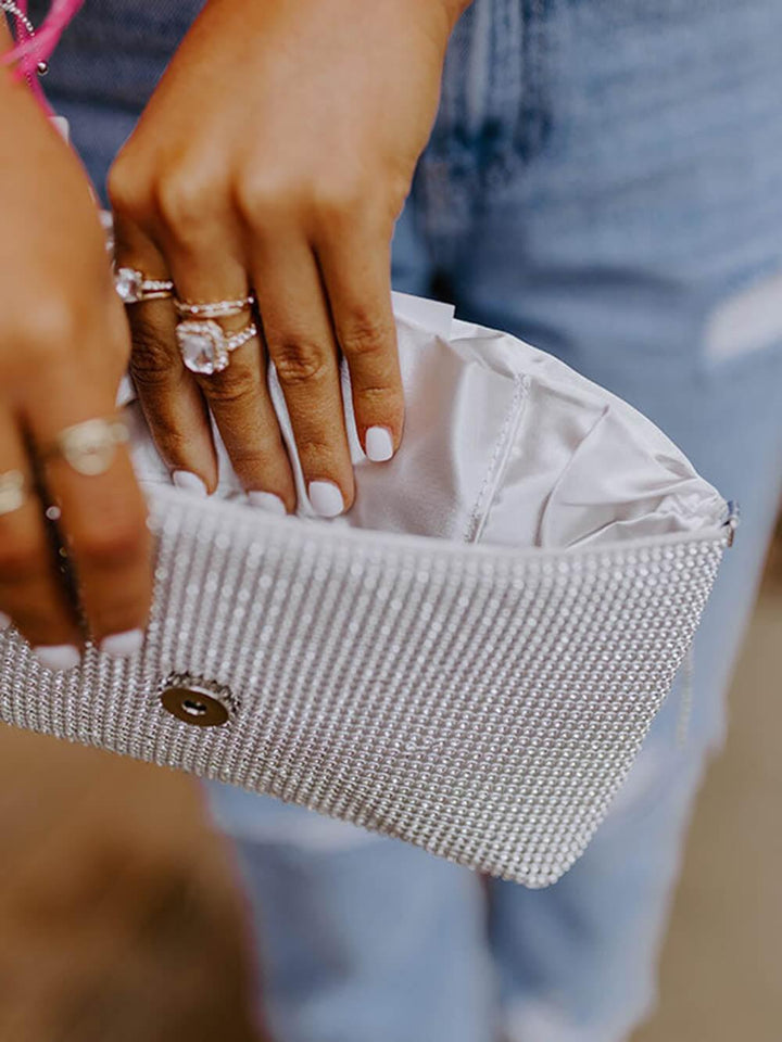 Susie | Women’s crystal beaded clutch bag with fringe detail