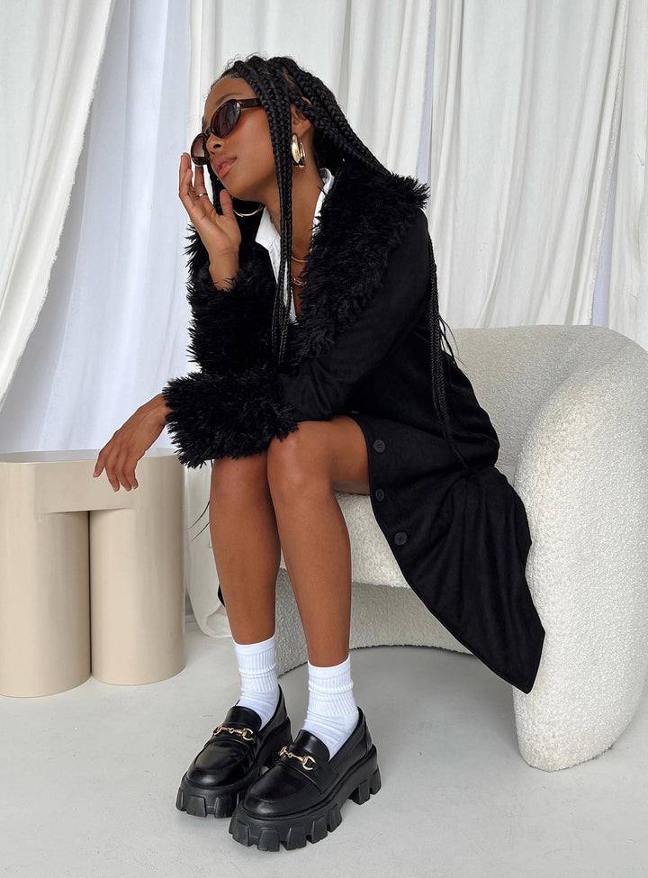 Pristine | Women’s long black trench coat with faux fur trim and button front