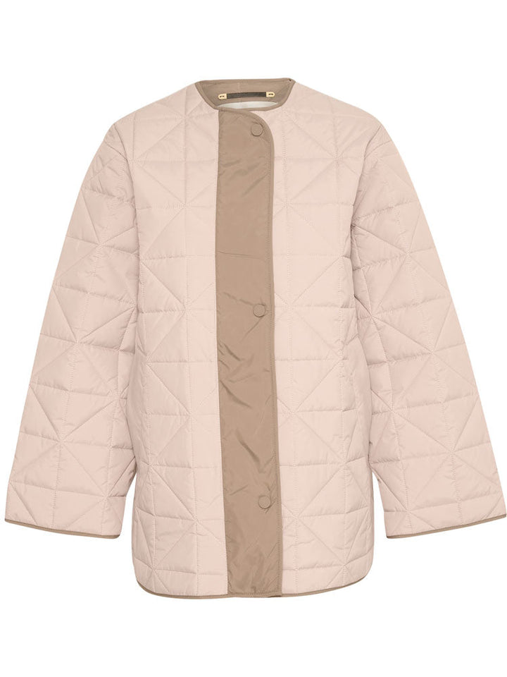 Peyton | Women’s minimalist quilted jacket with side slit details