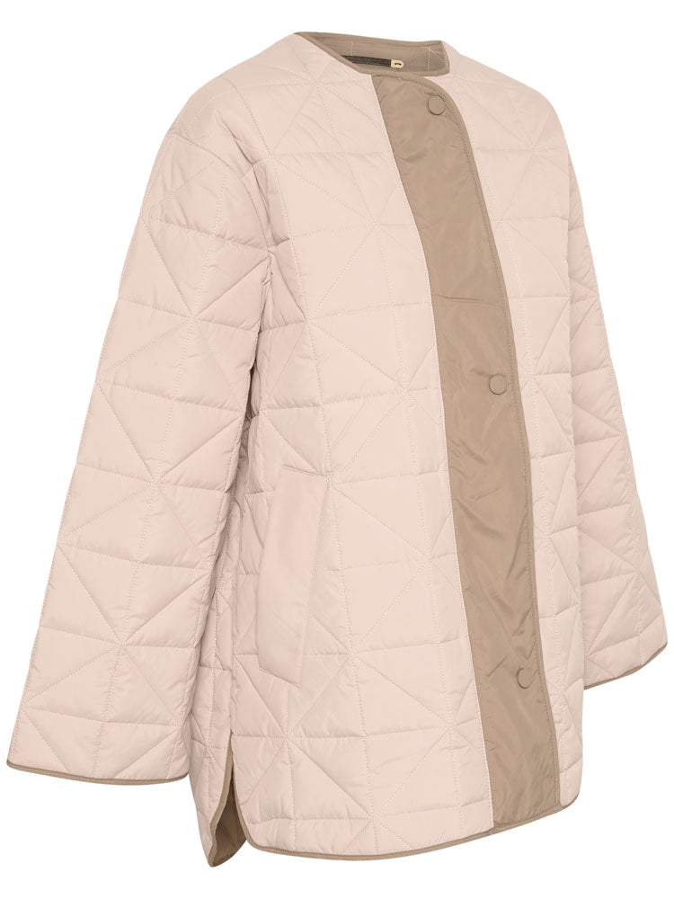 Peyton | Women’s minimalist quilted jacket with side slit details