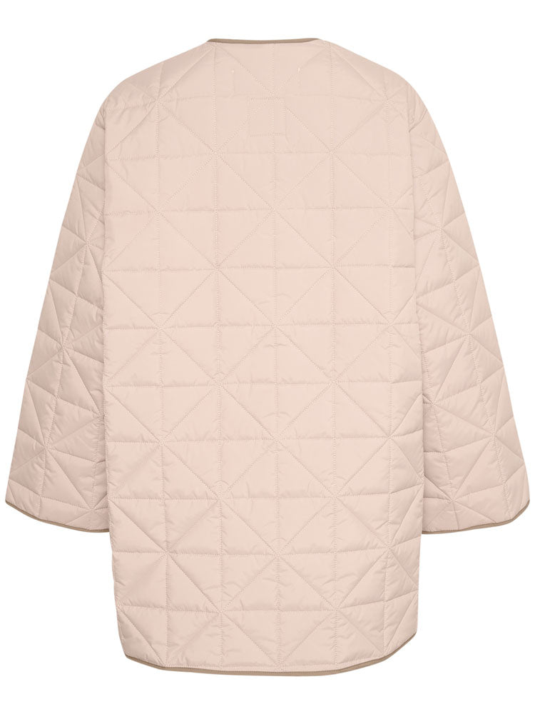 Peyton | Women’s minimalist quilted jacket with side slit details