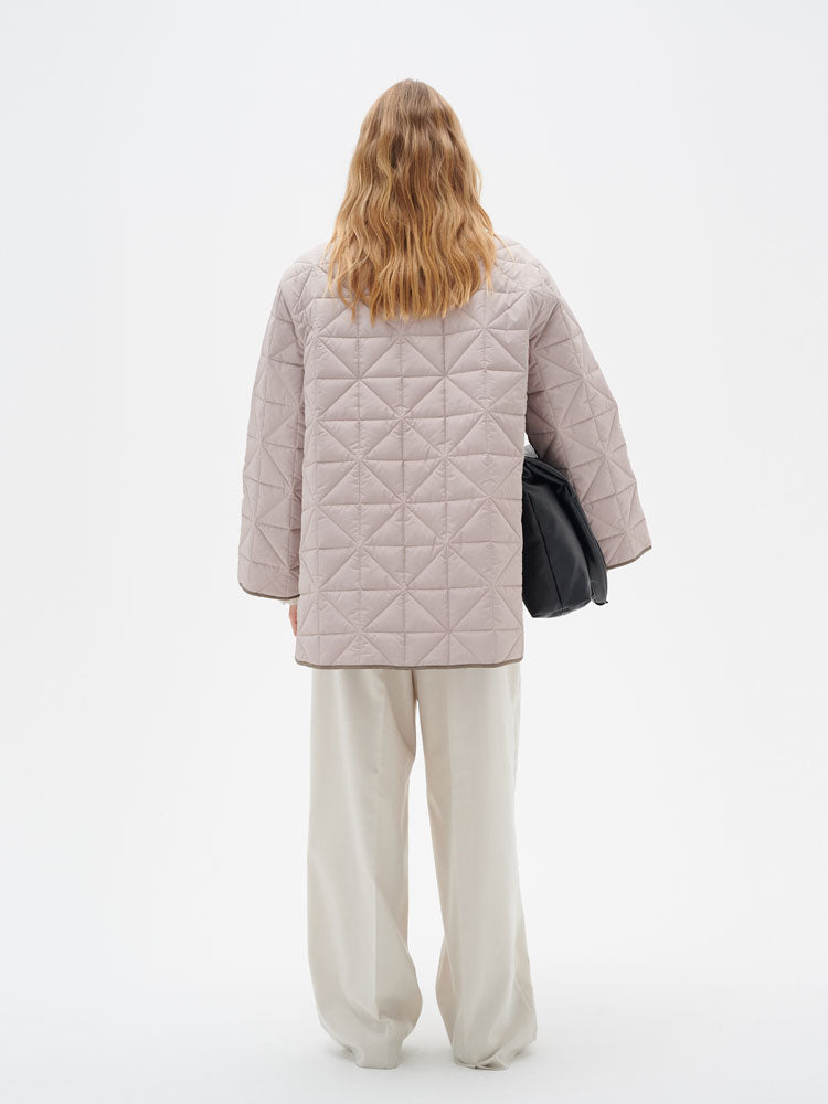 Peyton | Women’s minimalist quilted jacket with side slit details