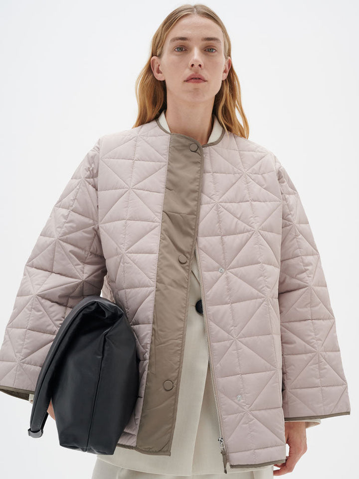Peyton | Women’s minimalist quilted jacket with side slit details