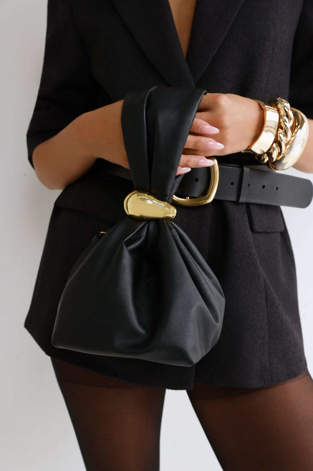 Anabell | Women’s pouch handle bag with gold hardware detail