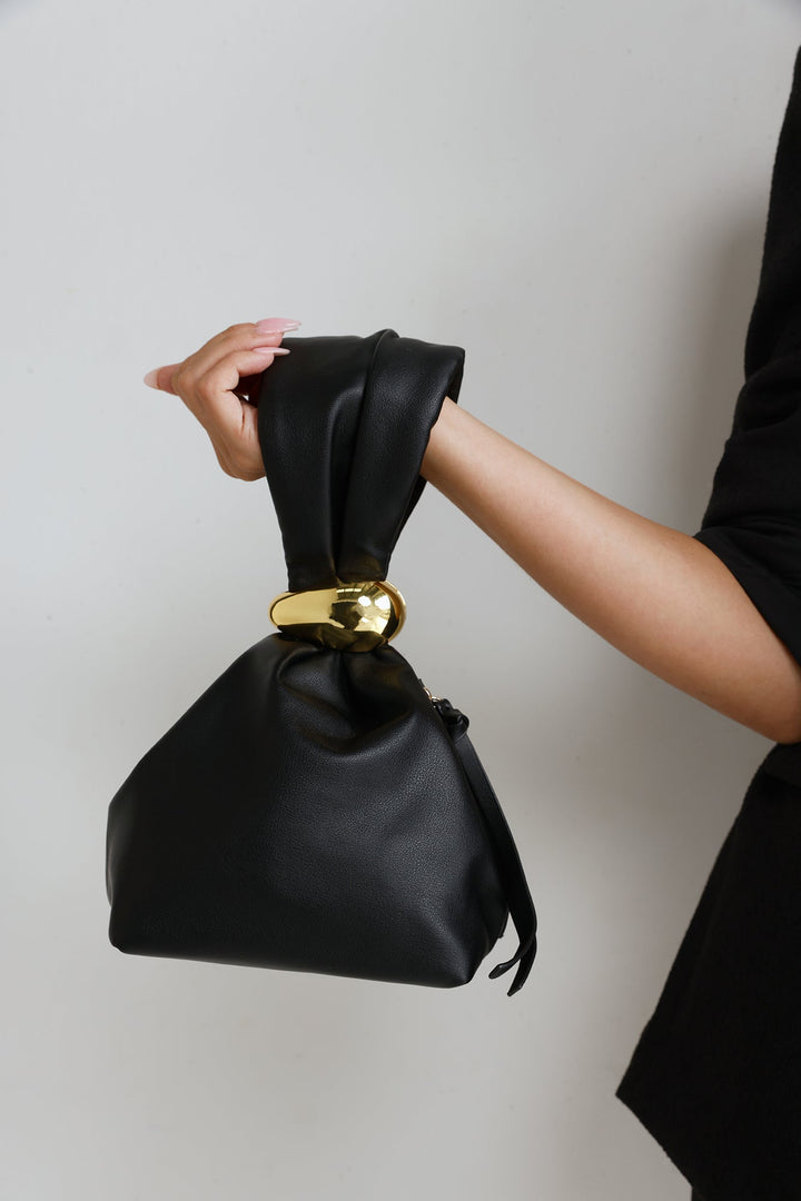 Anabell | Women’s pouch handle bag with gold hardware detail