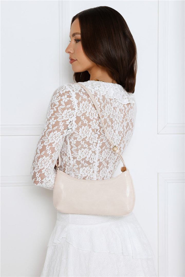 Bonnie | Women’s minimalist shoulder bag with curved rectangular design