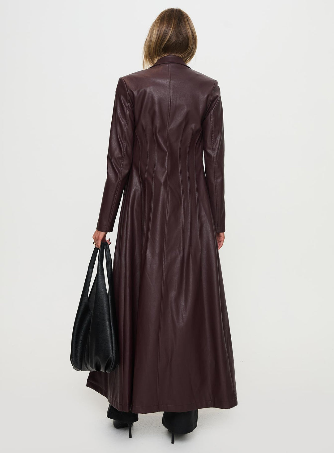 Kara | Women’s longline faux leather trench coat with lapel collar and pleat detail