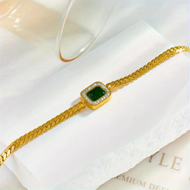 Louisa | Women’s gold chain bracelet with emerald centerpiece and adjustable clasp