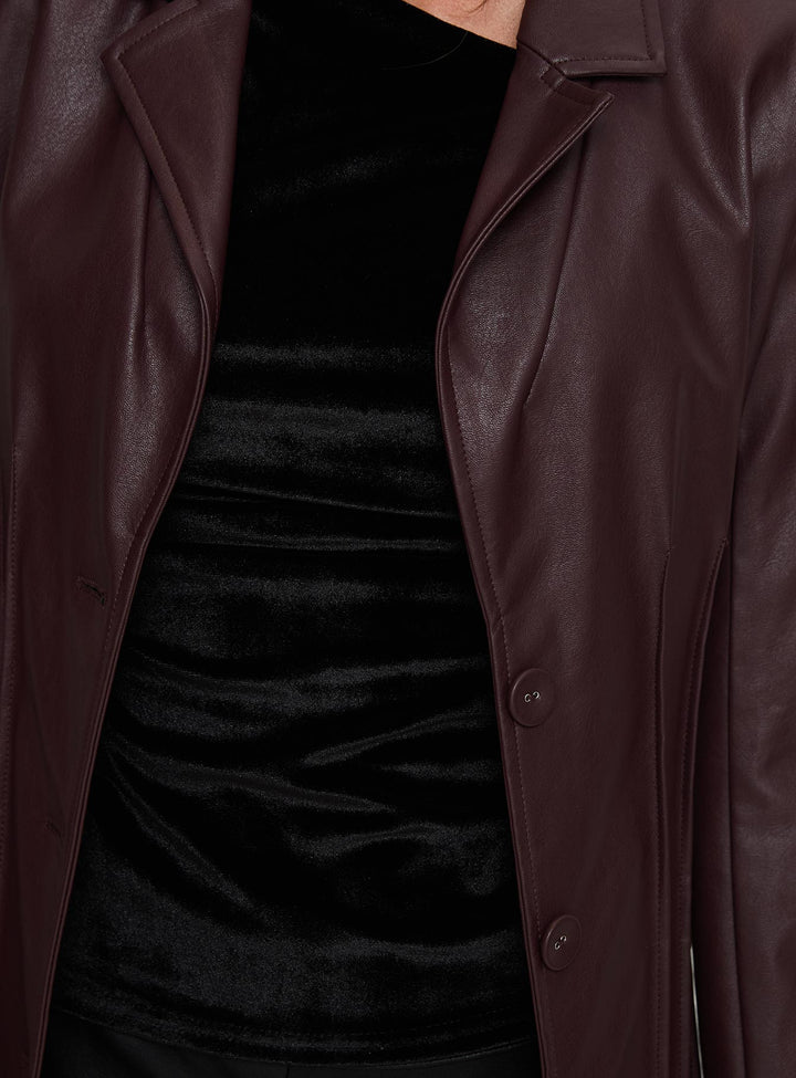 Kara | Women’s longline faux leather trench coat with lapel collar and pleat detail