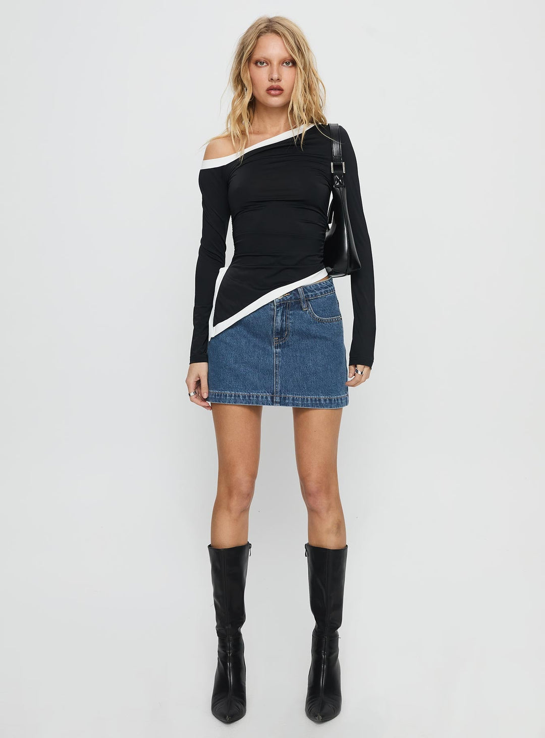 Xyriel | Women’s mid-rise denim mini skirt with five-pocket design and washed finish