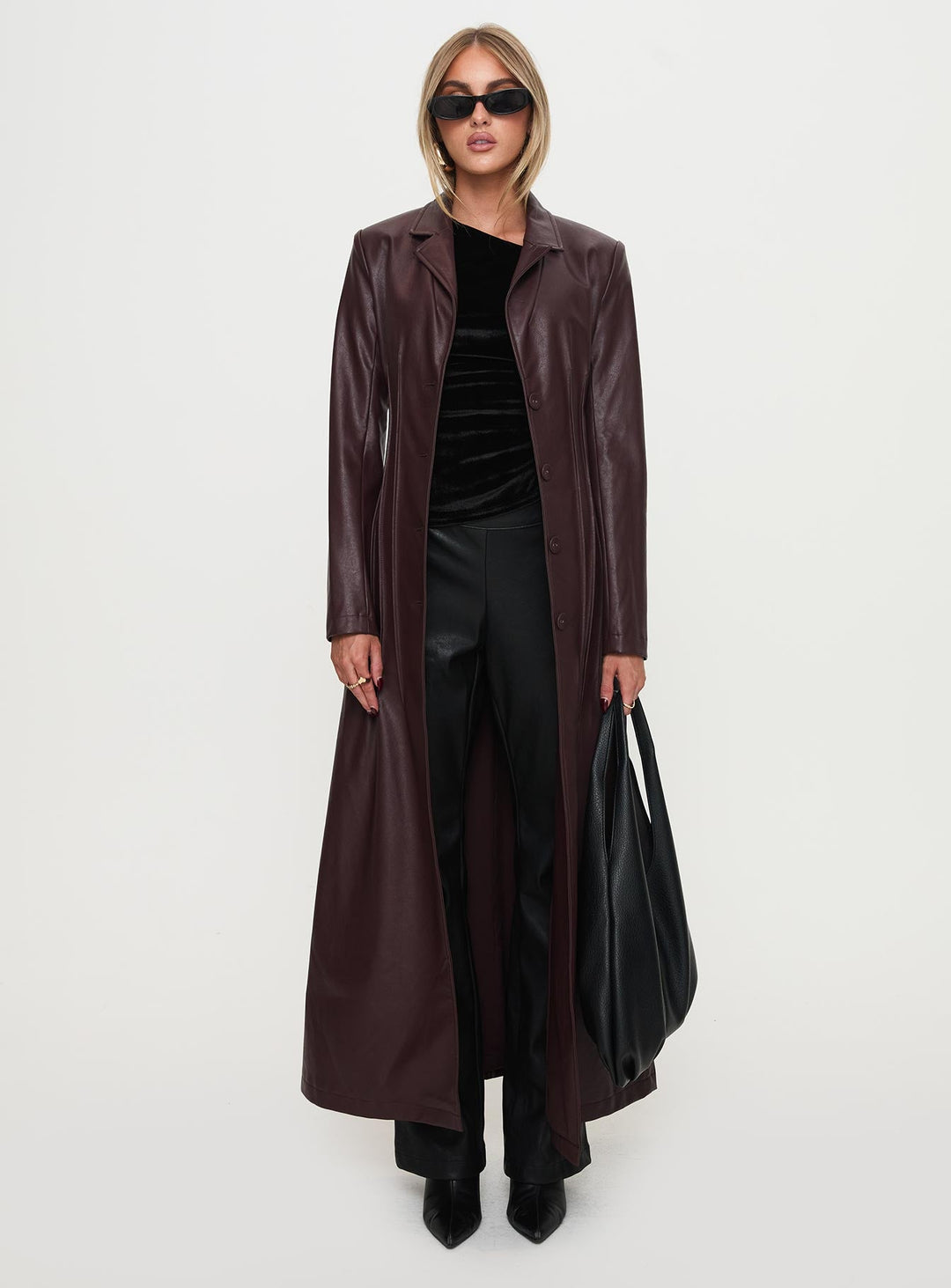 Kara | Women’s longline faux leather trench coat with lapel collar and pleat detail