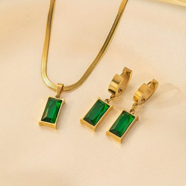 Lucille | Women’s jewelry set with emerald accents and golden finish