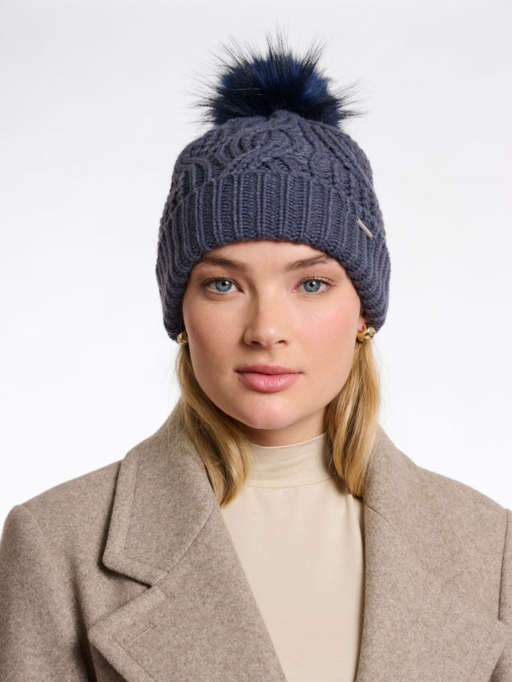 Raya | Women’s cable knit beanie with faux fur pom