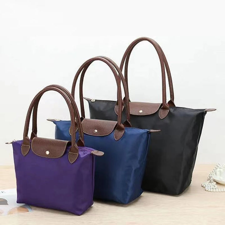 Ailla | Shoulder bag with compact shape and structured compartments
