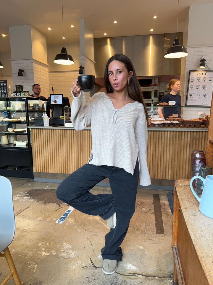 Everly | Women’s relaxed knit sweater with v-notch neckline and front tie detail