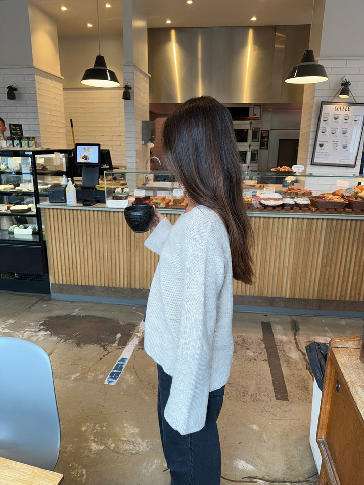 Everly | Women’s relaxed knit sweater with v-notch neckline and front tie detail