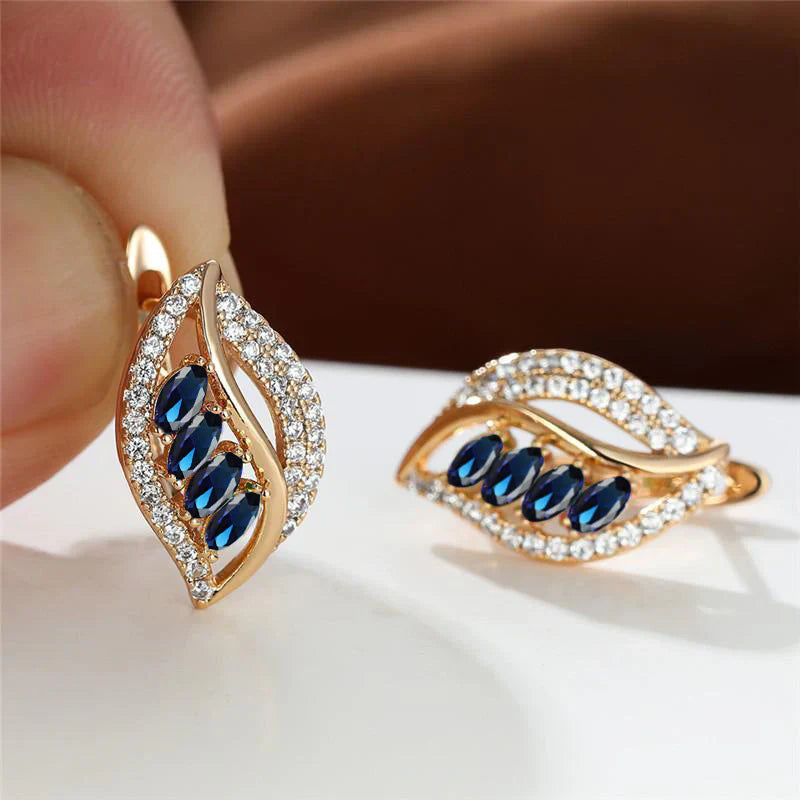 Ursula | Women’s gold drop earrings with crystal leaf design