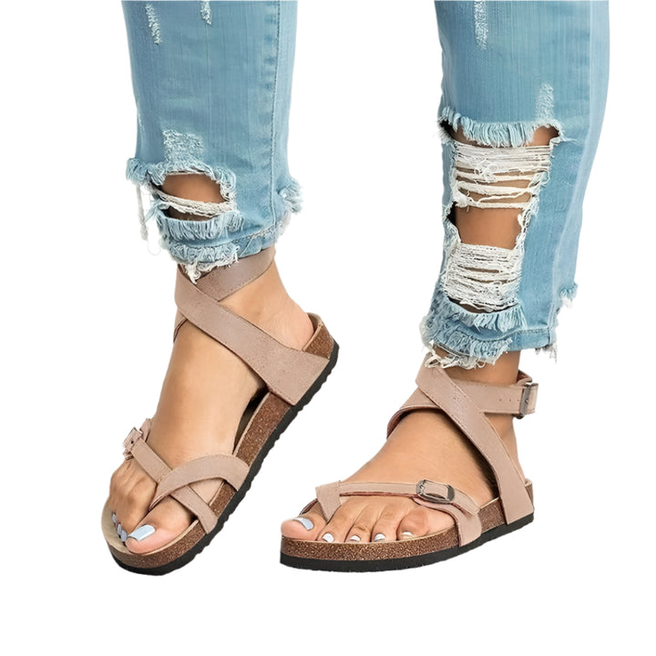 Women’s sandals with adjustable buckle and shaped sole