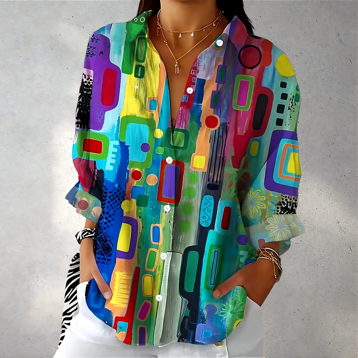 Dara | Women’s polo blouse with abstract print and loose shape