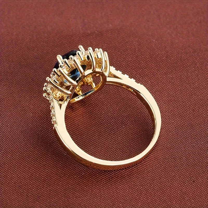 Bonnie | Women’s statement ring with sapphire blue stone and crystal halo design