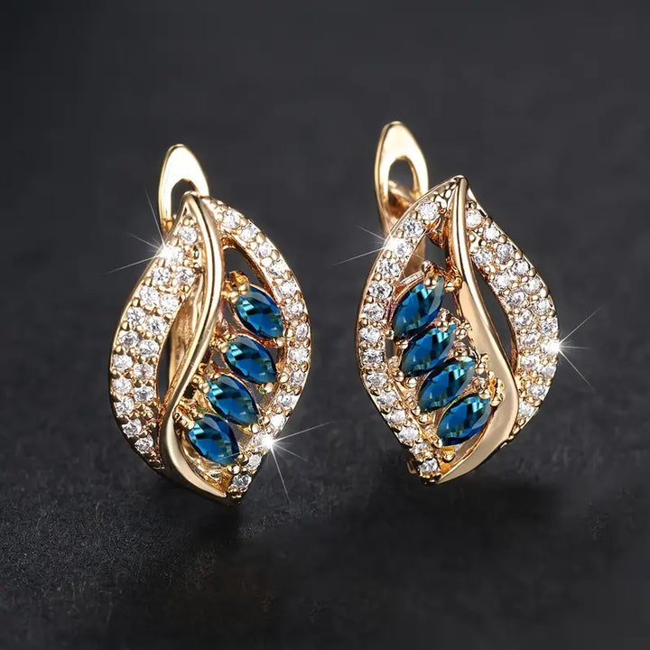 Ursula | Women’s gold drop earrings with crystal leaf design