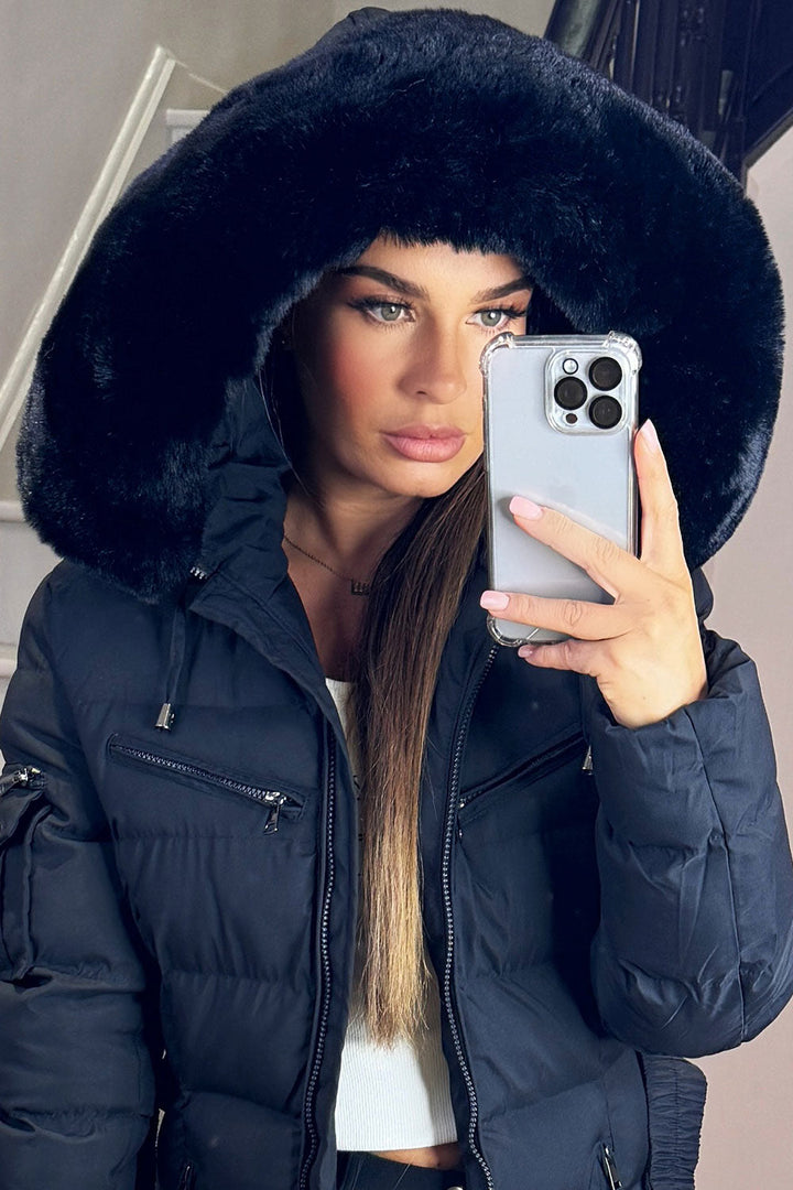 Madelyn | Women’s belted long puffer coat with faux fur hood