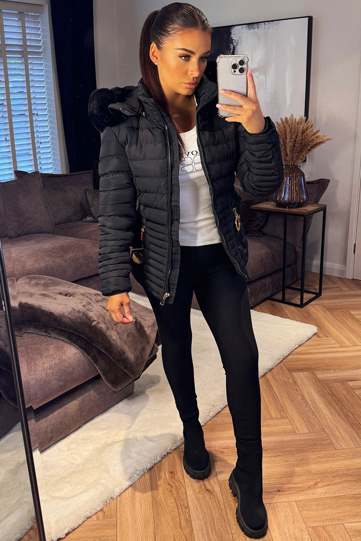 Ariel | Women’s faux fur hooded puffer jacket with gold belt